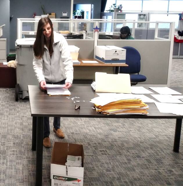 129426938_web1_harvey
Luzerne County Election Director Eryn Harvey sorts nomination petitions and other paperwork submitted by May 16 primary election candidates on Tuesday, which was the filing deadline.
Jennifer Learn-Andes | Times Leader