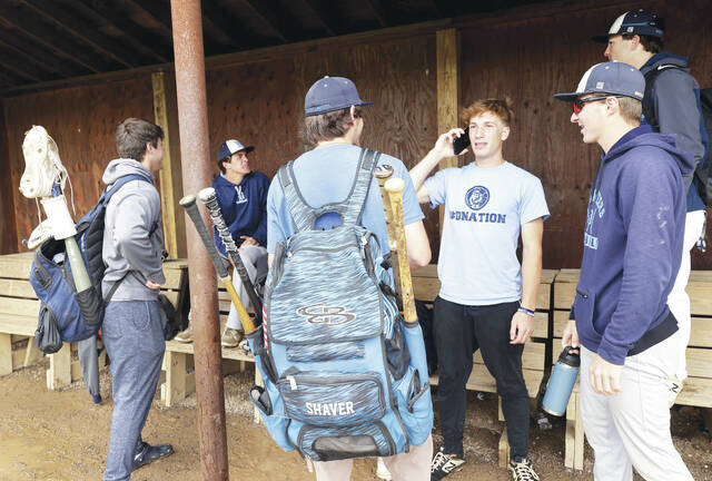 129735904_web1_thumbnail_dal_practice1_faa
Dallas players get ready to leave their field on Wednesday afternoon after heavy rain ended practice after about 30 minutes. The District 2 champion Mountaineers will play District 6 champion Bellefonte for the PIAA Class 4A state championship at 1:30 p.m. Friday at Penn State University.
Fred Adams | For Times Leader