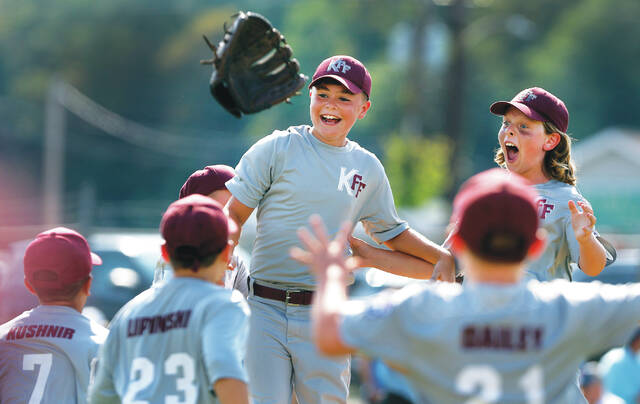 129804199_web1_kff_bk1_faa
Kingston/Forty Fort players celebrate their win over Back Mountain National for the District 31 Little League 8-10 baseball title on Saturday in West Pittston.
Fred Adams | For Times Leader