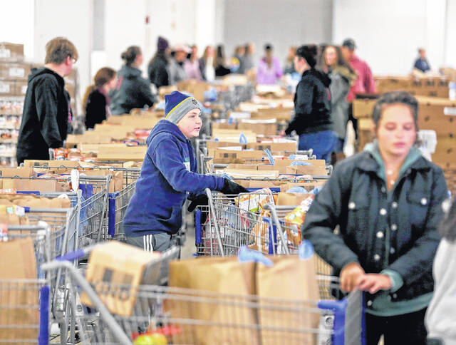 130100356_web1_TTL111719CEOfood_3.cmyk
Volunteers positions carts of food for the needy at the CEO Thanksgiving food giveaway at the former Sears store in the Wyoming Valley Mall in 2019. Southern Luzerne County residents in need will have free access to the Commission on Economic Opportunitys annual Thanksgiving food distribution program on Nov. 18 in Wilkes-Barre Township through a partnership between the county and public transit agencies, officials announced.
Times Leader file photo