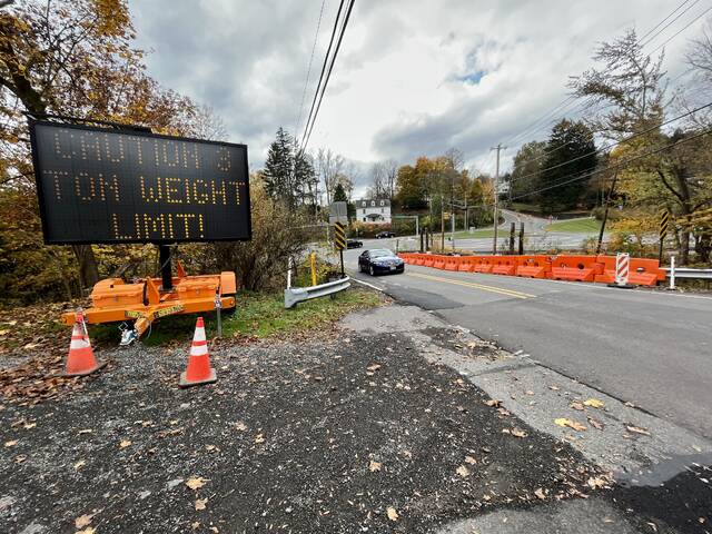 130106490_web1_IMG_8071
The Harris Hill Road Bridge in Kingston Township is seen looking toward Route 309 on Tuesday. Starting Friday, Nov. 3, the bridge over Toby Creek will be blocked off and remain closed until further notice due to structural deterioration, county officials said. It is slated for replacement in 2024.
Roger DuPuis | Times Leader