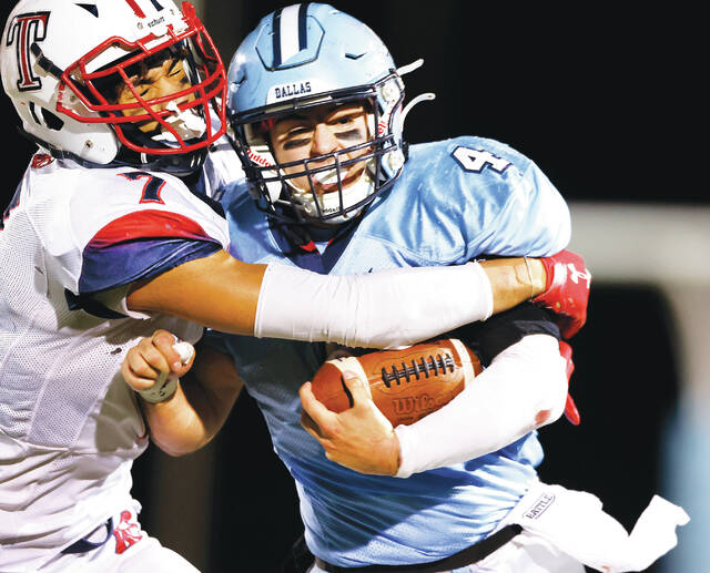 130150223_web1_dal_nan4_faa
Running back Dylan Geskey (4) has helped power Dallas to a 12-0 record and a spot in tonights District 2 Class 4A championship against Valley View.
Fred Adams | For Times Leader