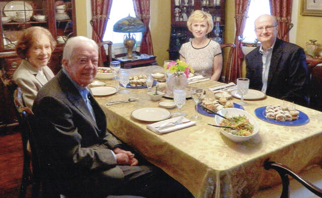 130172842_web1_President-and-Rosalynn-Carter-3
In this Norman Rockwell-like photo taken at the Cooks Plains, Pa. home in 2013, Diane and Larry Cook host a dinner with Plains, Ga.s most famous inhabitants, President Jimmy Carter and his wife Rosalyn, who passed away on Sunday, Nov. 19 at the age of 96.
Submitted Photo