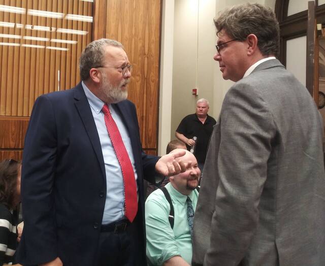 130522321_web1_divhead
Luzerne Countys new Administrative Services Division Head James Rose, at left, speaks to Visit Luzerne County Executive Director Alan K. Stout at the county courthouse Tuesday night following Roses council confirmation to the position.
Jennifer Learn-Andes | Times Leader