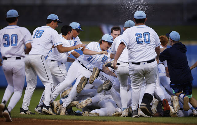 130642674_web1_d_sp2_faa
Dallas celebrates after Jack Leandris single with two outs in the bottom of the seventh gave the Mountaineers a 1-0 win over Scranton Prep in the District 2 Class 4A championship game at PNC Field.
Fred Adams | For Times Leader