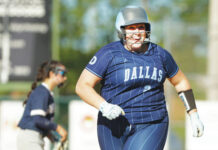 
			
				                                Dallas’ Carolyn Comitz is all smiles as she runs the bases after hitting a game-ending, three-run home run in the sixth inning.
                                 Fred Adams | For Times Leader

			
		
