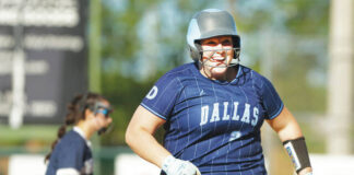 
			
				                                Dallas’ Carolyn Comitz is all smiles as she runs the bases after hitting a game-ending, three-run home run in the sixth inning.
                                 Fred Adams | For Times Leader

			
		