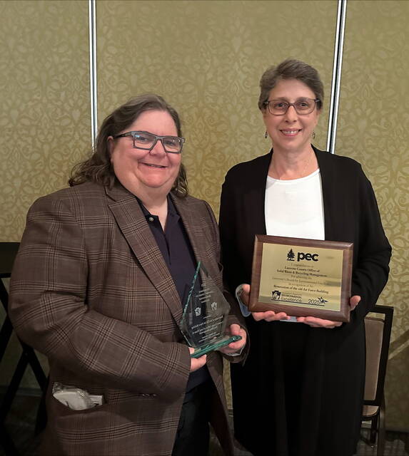 131582343_web1_Beth-Romilda-Award
Luzerne County Manager Romilda Crocamo, left, and county Recycling Coordinator Beth DeNardi accepted the Governors Award for Environmental Excellence in Harrisburg last week in recognition of the countys eco-friendly renovations of a former Air Reserve Center on Wyoming Avenue in Wyoming.
Submitted Photo