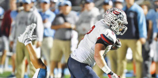 
			
				                                Pittston Areas Brody Spindler (0) breaks through a tackle by Tyce Masons to romp into the end zone for a 19-yard touchdown.
                                 Tony Callaio | For Times Leader

			
		