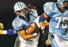 
			
				                                Dallas running back Sam Kelley picks up yards against Wyoming Valley West in the first quarter.
                                 Fred Adams | For Times Leader

			
		
