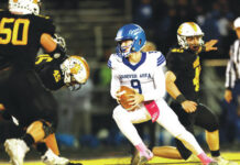 
			
				                                Lake-Lehman’s defense puts pressure on Hanover Area quarterback Logan Richardson before he completes the pass to set up a touchdown in the second quarter.
                                 Fred Adams | For Times Leader

			
		