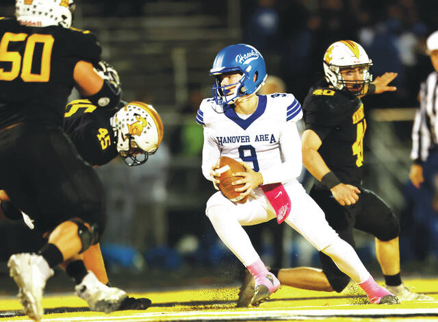 131863640_web1_leh_han5_faa
Lake-Lehmans defense puts pressure on Hanover Area quarterback Logan Richardson before he completes the pass to set up a touchdown in the second quarter.
Fred Adams | For Times Leader