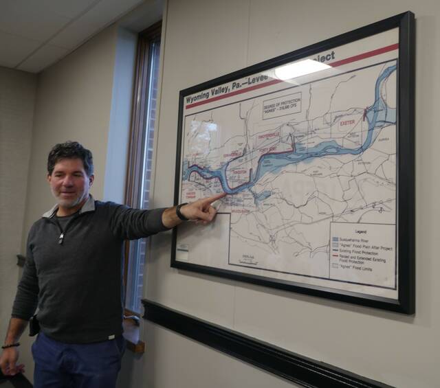 <p>During a special meeting Thursday, Luzerne County Flood Protection Authority Chairman Dominic Yannuzzi, an engineer, points to a curve in the Susquehanna River that could be contributing to nearby erosion that is inching toward part of the Wyoming Valley Levee system flood wall along Riverside Drive in Wilkes-Barre.</p>
                                 <p>Jennifer Learn-Andes | Times Leader</p>