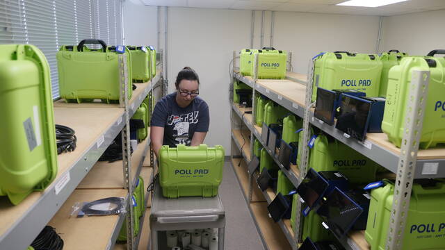 131893924_web1_emily
Among numerous tasks last week, Luzerne County Election Director Emily Cook prepared electronic poll books for delivery to Tuesdays general election polling places. The books are stored in the countys Penn Place Building in downtown Wilkes-Barre.
Jennifer Learn-Andes | Times Leader
