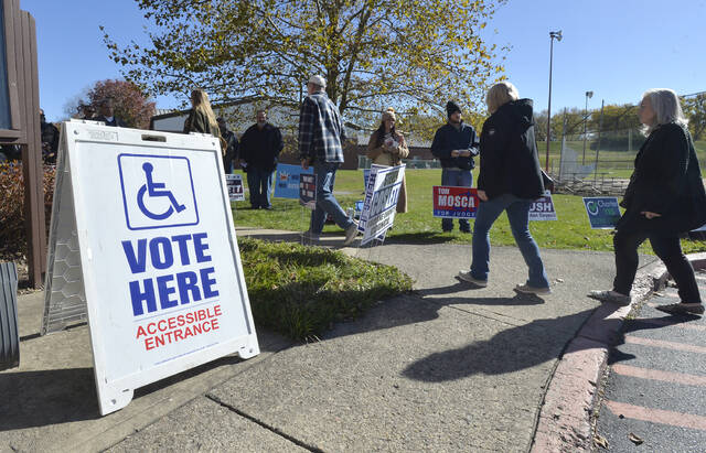 131904789_web1_Pic-1
Voters arrive at the Kingston Recreation Center on Tuesday.
Mark Moran | For Times Leader