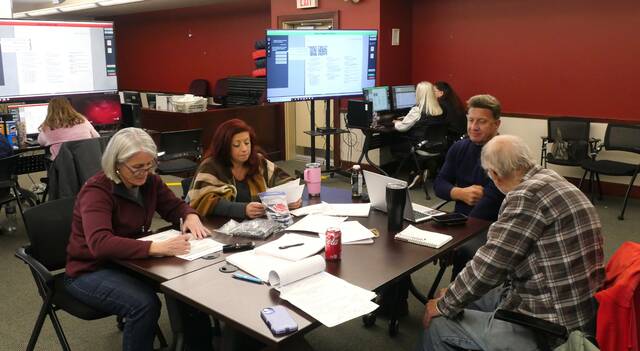 <p>Luzerne County Election Board members discuss Nov. 4 general election ballot issues during Wednesday’s adjudication. Clockwise, from left: County Election Board Chairwoman Christine Boyle, Vice Chairwoman Alyssa Fusaro, and Board members Rick Morelli and Daniel Schramm. Albert Schlosser, the fifth board member, was not in attendance.</p>
<p>Jennifer Learn-Andes | Times Leader</p>