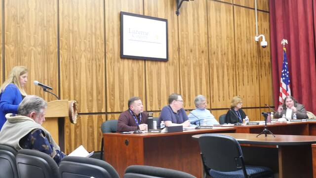 131957240_web1_budgetuse
Luzerne County Manager Romilda Crocamo, at right, makes a point about employee compensation during Tuesdays County Council work session, with county Budget/Finance Division Head Mary Roselle at the podium. Council members seated from left are: Jimmy Sabatino, Greg Wolovich, Chris Perry, and Patty Krushnowski.
Jennifer Learn-Andes | Times Leader