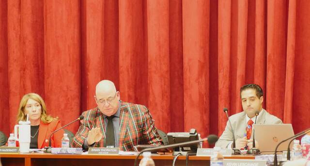 131983078_web1_thornton
Luzerne County Council Vice Chairman Brian Thornton, at center, explains reasons he was voting against the countys 2026 budget Tuesday. Councilwoman LeeAnn McDermott and council Chairman John Lombardo are seated on either side.
Jennifer Learn-Andes | Times Leader