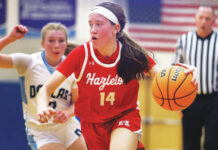 
			
				                                Hazleton Areas Kaitlyn Bindas works her way inside as Dallas Caitlyn Mizzer pursues in the second quarter, Bindas finished with a game-high 28 points.
                                 Fred Adams | For Times Leader

			
		