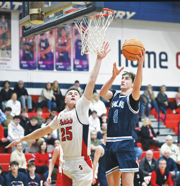 <p>Dallas’ Chris Flanagan (4) gets past Pittston Area’s John Jadus for a layup.</p>
<p>Tony Callaio | For Times Leader</p>