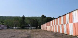 
			
				                                Luzerne County Council voted Tuesday to allocate an additional $850,000 in federal American Rescue Plan Act funds for capital projects at the county-owned Wyoming Valley Airport in Forty Fort and Wyoming, including replacement of these 1930s hangars.
                                 Times Leader file photo

			
		