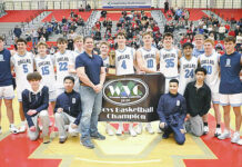 H.S. Boys Basketball: Dallas tops Crestwood for WVC title threepeat
Dallas displays the WVC championship banner and trophy after defeating Crestwood 43-38 on Saturday. It was the Mountaineers third straight season winning the tournament.
Tony Callaio | For Times Leader