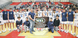 
			
				                                Dallas displays the WVC championship banner and trophy after defeating Crestwood 43-38 on Saturday. It was the Mountaineers third straight season winning the tournament.
                                 Tony Callaio | For Times Leader

			
		