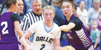 
			
				                                Caitlyn Mizzer of Dallas moves the ball as Wallenpaupacks Abby Cykosky defends in the first quarter.
                                 Fred Adams | For Times Leader

			
		