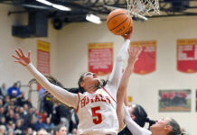 
			
				                                Holy Redeemers Bella Boylan (5) goes up high to pull down a rebound against Lake-Lehman.
                                 Tony Callaio | For Times Leader

			
		