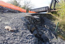 
			
				                                Luzerne Countys Flood Protection Authority board approved a contract Tuesday to address this erosion inching toward part of the Wyoming Valley Levee system flood wall along Riverside Drive in Wilkes-Barre. The flood wall is behind the orange netting.
                                 Times Leader File Photo

			
		