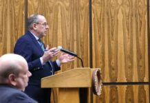 
			
				                                Wilkes-Barre Attorney Francis Hoegen appeared before Luzerne County Council this week, advocating for a real estate tax break construction deadline extension for a Wilkes-Barre Twp. warehouse project. Township Solicitor John Rodgers is seated in the foreground.
                                 Jennifer Learn-Andes | Times Leader

			
		