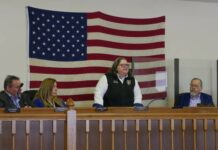 
			
				                                Luzerne County Manager Romilda Crocamo, standing, addresses attendees Tuesday during her latest town hall meeting at the Exeter Borough Building. Seated, from left, are: Chief Solicitor Harry W. Skene, Budget/Finance Division Head Mary Roselle, and Administrative Services Division Head Jim Rose.
                                 Jennifer Learn-Andes | Times Leader

			
		