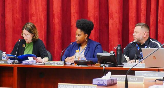 <p>Luzerne County Councilwoman Denise Williams, at left, reads a proclamation during Tuesday’s meeting. Also shown are Council Vice Chairwoman Brittany Stephenson and Council Chairman Jimmy Sabatino.</p>
<p>Jennifer Learn-Andes | Times Leader</p>