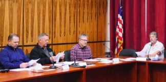 
			
				                                Luzerne County Planning Commission members review documents Thursday before voting to recommend a proposed data center zoning amendment to County Council for its consideration. From left: David Wychock, William F. Kane, Frank Sindaco, and Peter P. Mikitish.
                                 Jennifer Learn-Andes | Times Leader

			
		