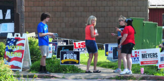 
			
				                                A voter stops to chat with poll workers Tuesday at the Kingston Recreation Center.
                                 Mark Moran | For Times Leader

			
		