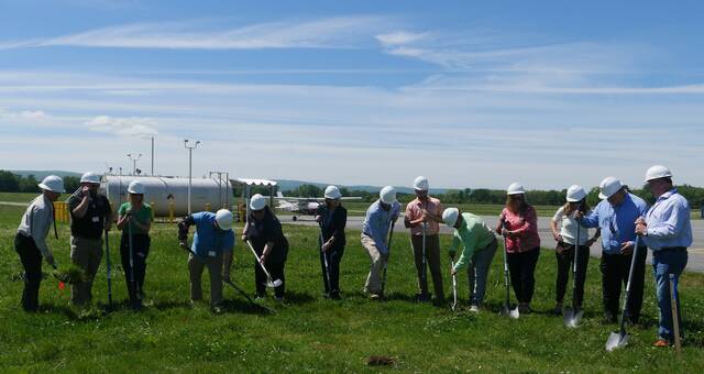 <p>Luzerne County officials and others participate in a groundbreaking Tuesday for a $12.5 million project at the county-owned Wyoming Valley Airport in Forty Fort and Wyoming.</p>
<p>Jennifer Learn-Andes | Times Leader</p>