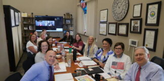 
			
				                                Luzerne Countys adult treatment court team meets for hours every Friday to review client case files at the courthouse. Shown clockwise, from the foreground at left: Tim Hlivia, probation officer; Maura Tunis, county defense attorney; Jennifer Weiss, senior probation officer; Laura Biga, lead treatment court case manager; Shannon Lai, treatment court case manager; Amanda Frandella, an addiction medicine fellow participating as an observer; Patrick McHale, a Volunteers of America case manager assisting the team with housing matters; Princess Morgan, county prison treatment coordinator; Alex Zupancic, Wyoming Valley Drug and Alcohol Services counselor: Allyson Kacmarski, county DAs Office specialty court programs division chief; Aleesha Whitaker, assistant coordinator of treatment coordinators; Danielle T. Goldowski, county treatment courts coordinator; and county Court of Common Pleas Judge Joseph F. Sklarosky Jr. Shown on the remote screen at the rear is Jill Sprau, county drug and alcohol assistant administrator.
                                 Jennifer Learn-Andes | Times Leader

			
		
